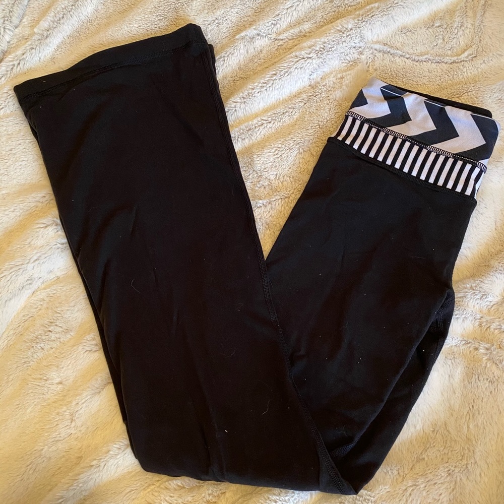 Black Lululemon flare yoga pants.
